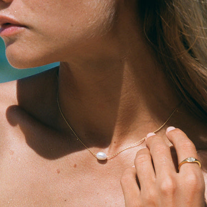 Collier ras-de-cou en perles baroques